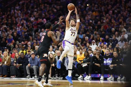 NBA roundup: Luka Doncic, LeBron James lead Lakers past 76ers in return