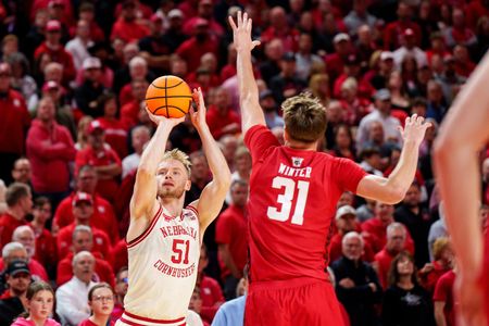 Top 25 roundup: No. 23 Nebraska wallops Wisconsin for 14th straight win