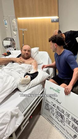 Australia’s ‘Bondi Hero’ handed $1.65 million collected from fundraising