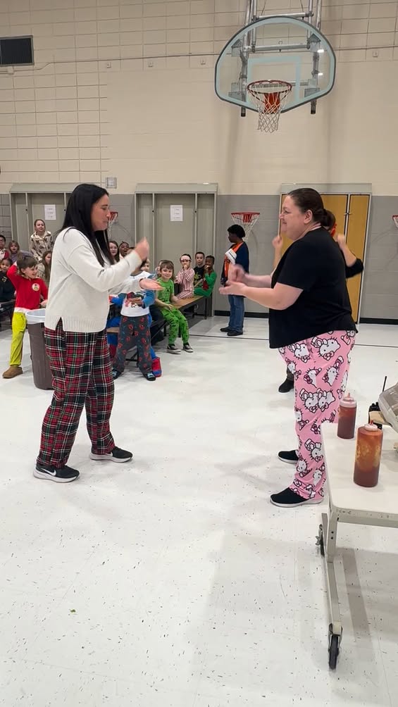 Rock, Papers, Scissors showdown at Lincoln. Mrs. McGruder with the win!