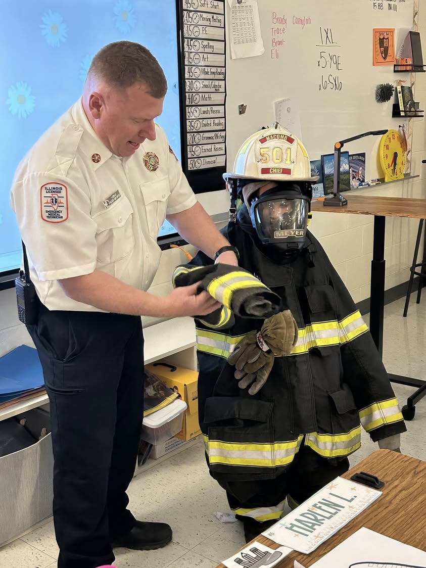 Miss Coker’s class had Fire Chief Dan Meyer join us to teach about the fire department, gear, and operations. Students e…