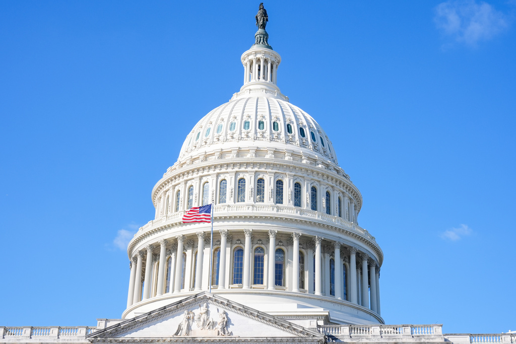 Police arrest man who ran toward the US Capitol building holding a shotgun