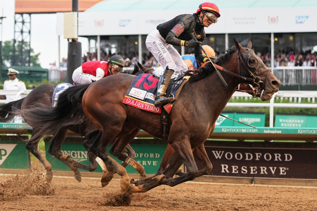 Golden Tempo takes the Kentucky Derby as Cherie DeVaux becomes the 1st woman to train its winner