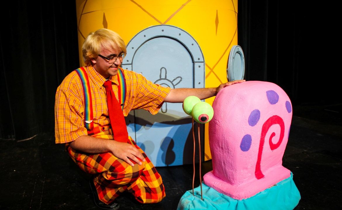 He Is an Itsy Bitsy Teenie Weenie Yellow Tyke Who’s from Bikini: Quad City Music Guild’s “The SpongeBob Musical,” at the Prospect Park Auditorium through July 19